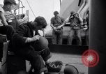 Image of Sailors are issued combat helmets aboard the USS Nelson  Atlantic Ocean, 1943, second 53 stock footage video 65675027935