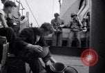 Image of Sailors are issued combat helmets aboard the USS Nelson  Atlantic Ocean, 1943, second 54 stock footage video 65675027935