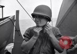 Image of Sailors are issued combat helmets aboard the USS Nelson  Atlantic Ocean, 1943, second 56 stock footage video 65675027935