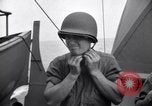 Image of Sailors are issued combat helmets aboard the USS Nelson  Atlantic Ocean, 1943, second 57 stock footage video 65675027935