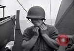 Image of Sailors are issued combat helmets aboard the USS Nelson  Atlantic Ocean, 1943, second 58 stock footage video 65675027935