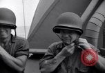 Image of Sailors are issued combat helmets aboard the USS Nelson  Atlantic Ocean, 1943, second 60 stock footage video 65675027935