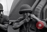 Image of Sailors are issued combat helmets aboard the USS Nelson  Atlantic Ocean, 1943, second 61 stock footage video 65675027935