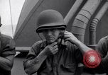 Image of Sailors are issued combat helmets aboard the USS Nelson  Atlantic Ocean, 1943, second 62 stock footage video 65675027935