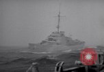 Image of Two US Coast Guard cutters on convoy duty Atlantic Ocean, 1943, second 41 stock footage video 65675027940