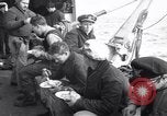 Image of Crew of USCGC Campbell have lunch on deck Nova Scotia, 1943, second 4 stock footage video 65675027942
