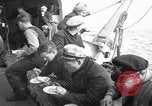 Image of Crew of USCGC Campbell have lunch on deck Nova Scotia, 1943, second 8 stock footage video 65675027942