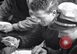 Image of Crew of USCGC Campbell have lunch on deck Nova Scotia, 1943, second 9 stock footage video 65675027942