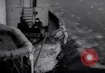 Image of Crew of USCGC Campbell have lunch on deck Nova Scotia, 1943, second 18 stock footage video 65675027942