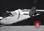 Image of SB2C airplane crashes while landing on USS Bunker Hill Pacific Theater, 1944, second 16 stock footage video 65675027955
