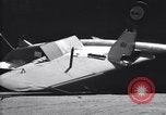 Image of SB2C airplane crashes while landing on USS Bunker Hill Pacific Theater, 1944, second 17 stock footage video 65675027955