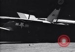 Image of SB2C airplane crashes while landing on USS Bunker Hill Pacific Theater, 1944, second 20 stock footage video 65675027955