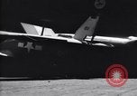Image of SB2C airplane crashes while landing on USS Bunker Hill Pacific Theater, 1944, second 22 stock footage video 65675027955