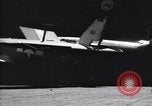 Image of SB2C airplane crashes while landing on USS Bunker Hill Pacific Theater, 1944, second 23 stock footage video 65675027955