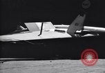 Image of SB2C airplane crashes while landing on USS Bunker Hill Pacific Theater, 1944, second 30 stock footage video 65675027955