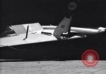 Image of SB2C airplane crashes while landing on USS Bunker Hill Pacific Theater, 1944, second 32 stock footage video 65675027955