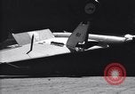 Image of SB2C airplane crashes while landing on USS Bunker Hill Pacific Theater, 1944, second 33 stock footage video 65675027955