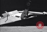 Image of SB2C airplane crashes while landing on USS Bunker Hill Pacific Theater, 1944, second 36 stock footage video 65675027955