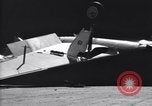 Image of SB2C airplane crashes while landing on USS Bunker Hill Pacific Theater, 1944, second 37 stock footage video 65675027955