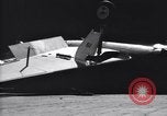 Image of SB2C airplane crashes while landing on USS Bunker Hill Pacific Theater, 1944, second 38 stock footage video 65675027955