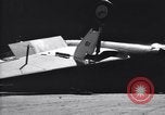 Image of SB2C airplane crashes while landing on USS Bunker Hill Pacific Theater, 1944, second 39 stock footage video 65675027955