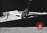Image of SB2C airplane crashes while landing on USS Bunker Hill Pacific Theater, 1944, second 40 stock footage video 65675027955