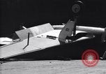 Image of SB2C airplane crashes while landing on USS Bunker Hill Pacific Theater, 1944, second 56 stock footage video 65675027955