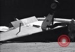 Image of SB2C airplane crashes while landing on USS Bunker Hill Pacific Theater, 1944, second 57 stock footage video 65675027955