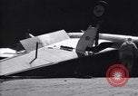 Image of SB2C airplane crashes while landing on USS Bunker Hill Pacific Theater, 1944, second 58 stock footage video 65675027955