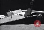Image of SB2C airplane crashes while landing on USS Bunker Hill Pacific Theater, 1944, second 59 stock footage video 65675027955