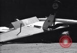 Image of SB2C airplane crashes while landing on USS Bunker Hill Pacific Theater, 1944, second 61 stock footage video 65675027955