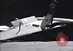Image of SB2C airplane crashes while landing on USS Bunker Hill Pacific Theater, 1944, second 62 stock footage video 65675027955