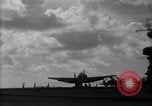 Image of TBF Avenger airplane noses over during landing Pacific Theater, 1944, second 10 stock footage video 65675027956
