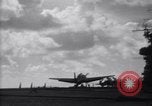 Image of TBF Avenger airplane noses over during landing Pacific Theater, 1944, second 11 stock footage video 65675027956
