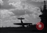 Image of TBF Avenger airplane noses over during landing Pacific Theater, 1944, second 14 stock footage video 65675027956