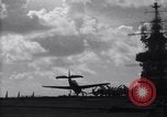 Image of TBF Avenger airplane noses over during landing Pacific Theater, 1944, second 23 stock footage video 65675027956