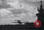 Image of TBF Avenger airplane noses over during landing Pacific Theater, 1944, second 25 stock footage video 65675027956