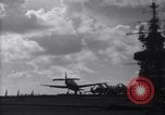 Image of TBF Avenger airplane noses over during landing Pacific Theater, 1944, second 26 stock footage video 65675027956