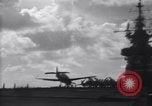 Image of TBF Avenger airplane noses over during landing Pacific Theater, 1944, second 34 stock footage video 65675027956