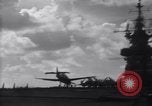 Image of TBF Avenger airplane noses over during landing Pacific Theater, 1944, second 35 stock footage video 65675027956