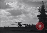 Image of TBF Avenger airplane noses over during landing Pacific Theater, 1944, second 37 stock footage video 65675027956