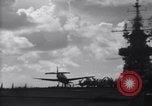 Image of TBF Avenger airplane noses over during landing Pacific Theater, 1944, second 39 stock footage video 65675027956