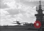 Image of TBF Avenger airplane noses over during landing Pacific Theater, 1944, second 50 stock footage video 65675027956