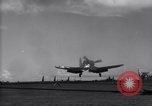 Image of F4U aircraft noses over during landing on USS Bunker Hill Pacific Theater, 1944, second 3 stock footage video 65675027958