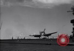 Image of F4U aircraft noses over during landing on USS Bunker Hill Pacific Theater, 1944, second 5 stock footage video 65675027958