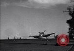 Image of F4U aircraft noses over during landing on USS Bunker Hill Pacific Theater, 1944, second 6 stock footage video 65675027958