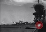 Image of F4U aircraft noses over during landing on USS Bunker Hill Pacific Theater, 1944, second 18 stock footage video 65675027958
