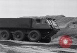 Image of British Stalwart and Gadabout all terrain vehicles United Kingdom, 1963, second 4 stock footage video 65675027996
