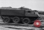 Image of British Stalwart and Gadabout all terrain vehicles United Kingdom, 1963, second 5 stock footage video 65675027996