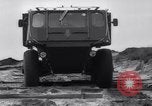 Image of British Stalwart and Gadabout all terrain vehicles United Kingdom, 1963, second 7 stock footage video 65675027996